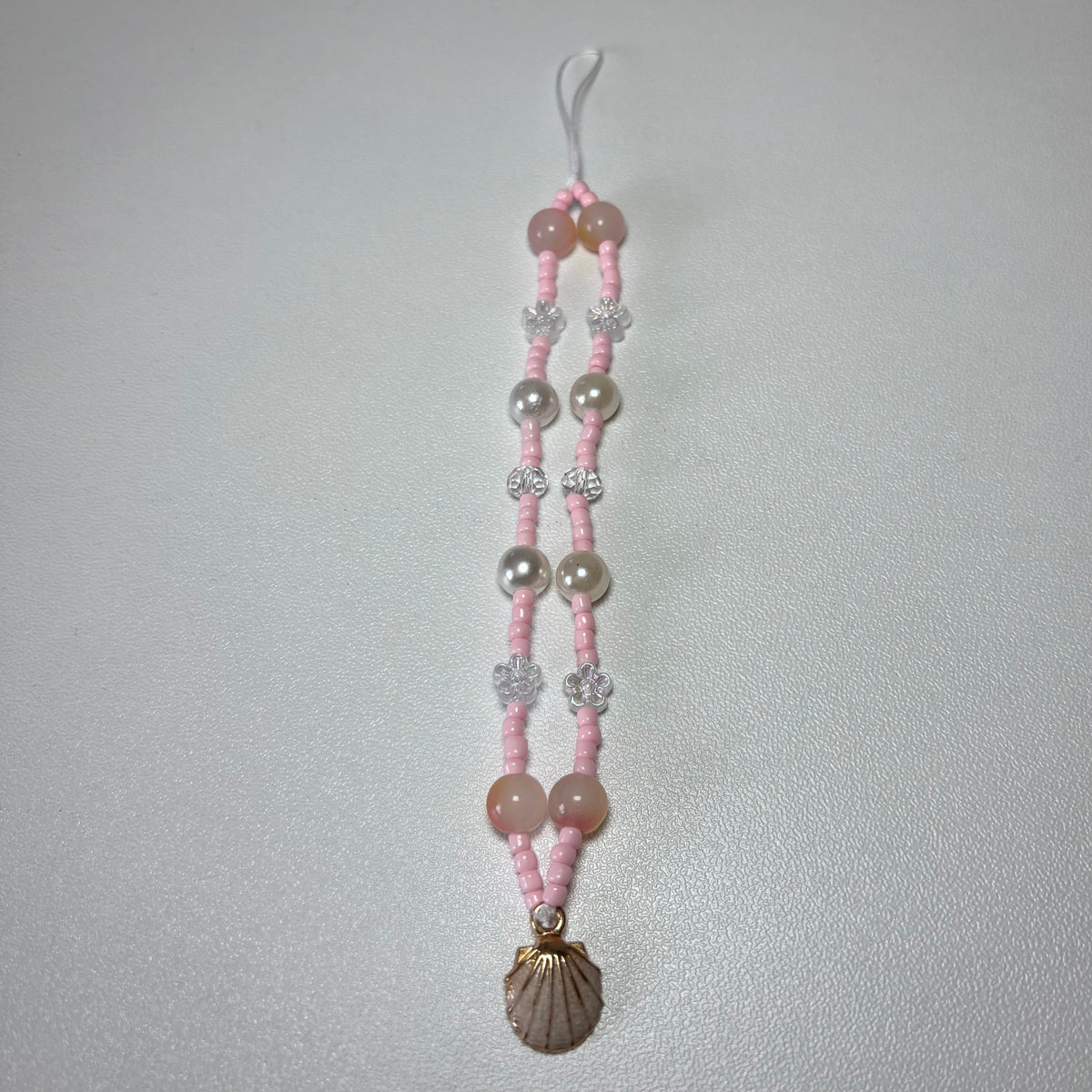 Peach clam shell phone charm 🫧