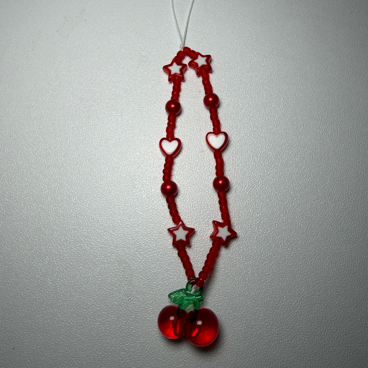 Cherry phone charms 🍒