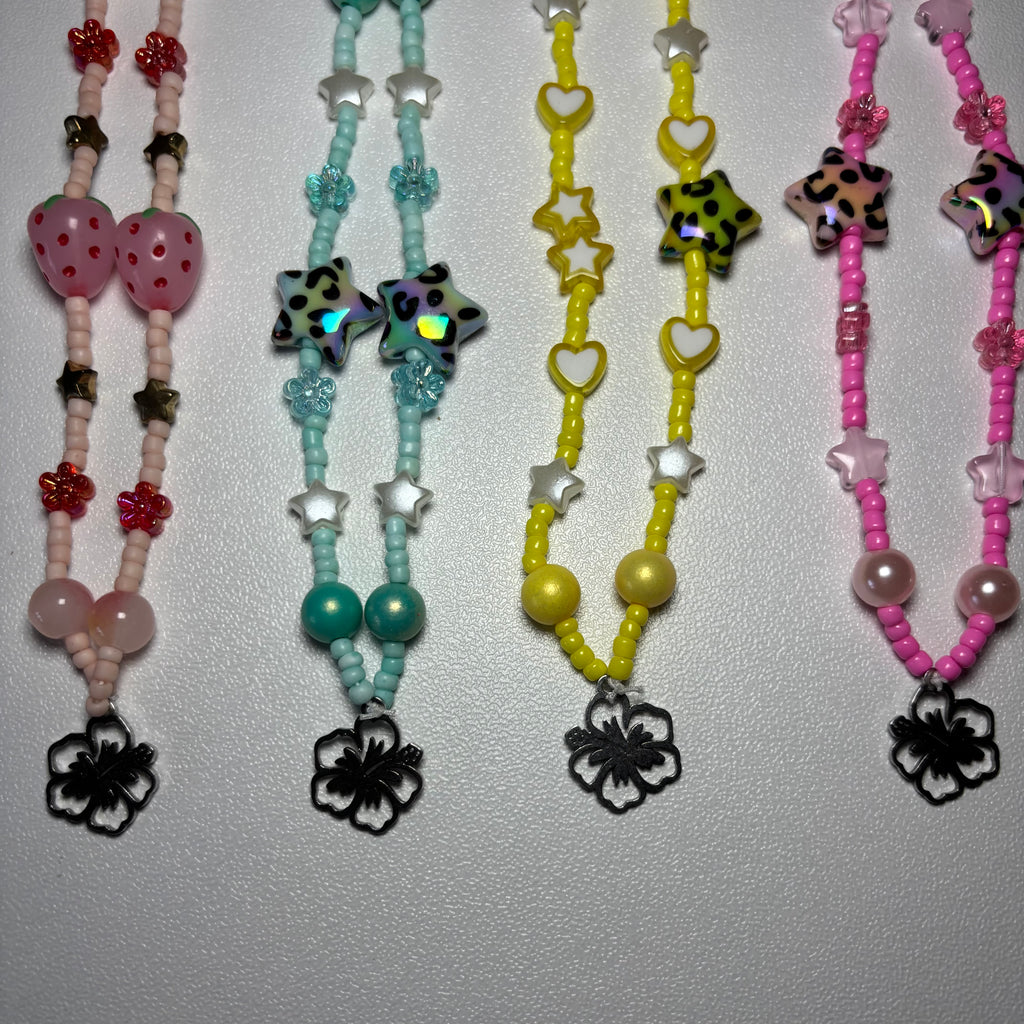 Hawaiian flower midnight sun phone charms 🌺