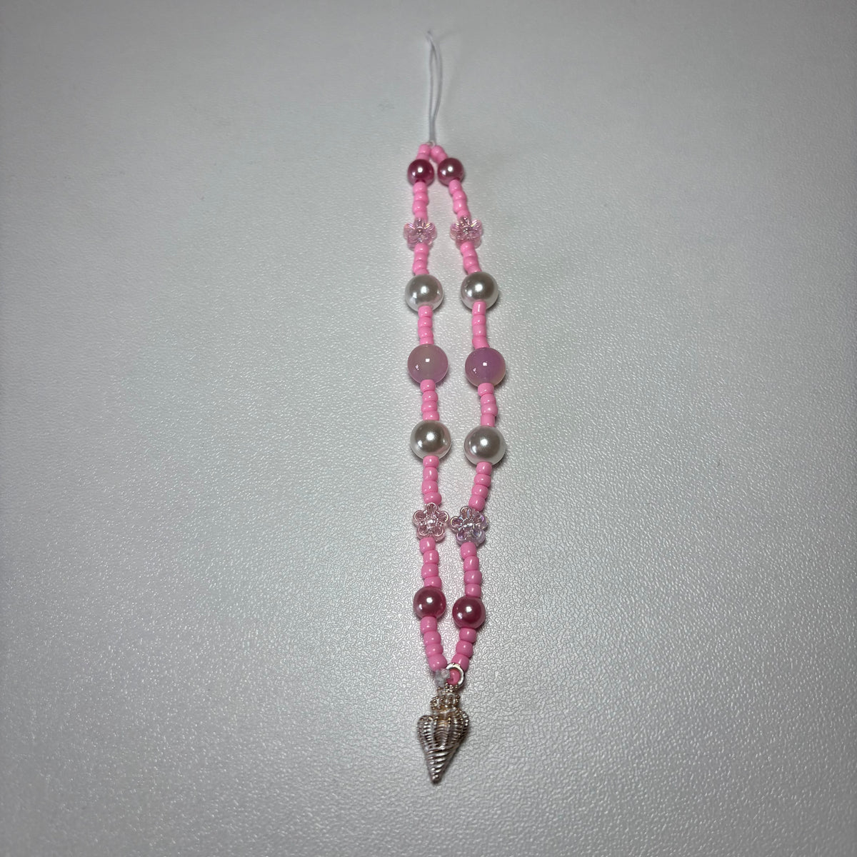 Pink shell phone charm 🐚